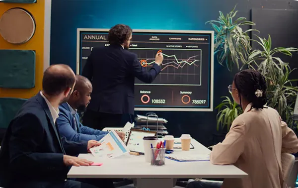 Team reviewing financial reports and dashboards together