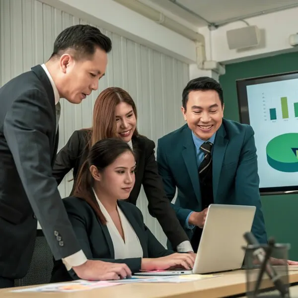 Team reviewing employee benefits documentation